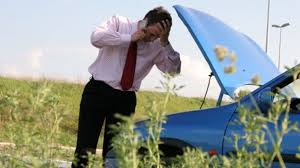 guy with broken down car